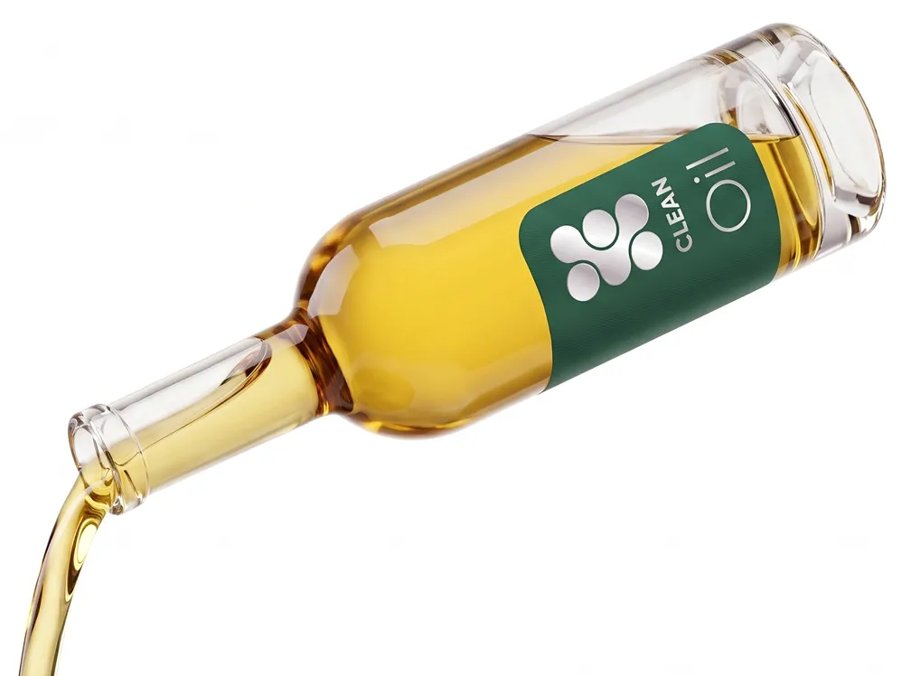 CLEANOil™ pouring from its bottle